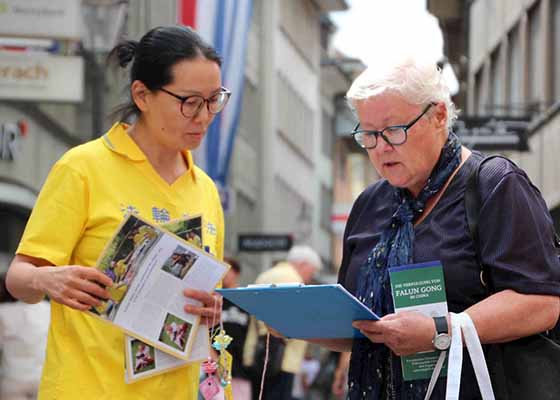 Image for article Switzerland: Practitioners’ Activities in Lucerne Raise Awareness of the Ongoing Persecution