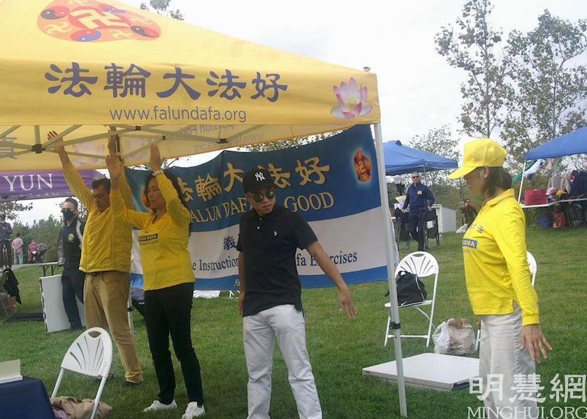 Image for article New Jersey: Practitioners Introduce Falun Dafa at Korean Harvest and Folklore Festival