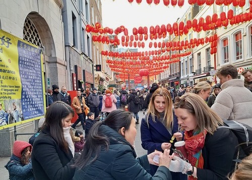 Image for article London, UK: Practitioners Raise Awareness of the Persecution on Chinese New Year