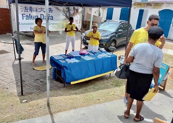 Image for article Caribbean: Falun Dafa Practitioners Expose the CCP’s Crimes on the 24th Anniversary of Efforts to End the Persecution