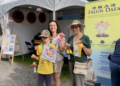 Image for article Falun Dafa Admired at Festival in Quebec “Falun Dafa Is What I Have Been Looking for!”