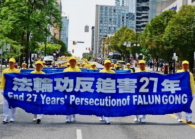 Image for article Vancouver: Grand March and Group Exercises Raise Awareness of the CCP’s 27 Years of Persecuting Falun Gong