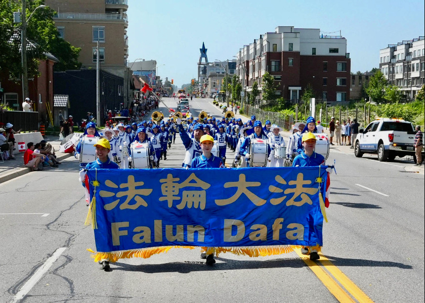 Image for article Falun Dafa Shines in Aurora Canada Day Parade